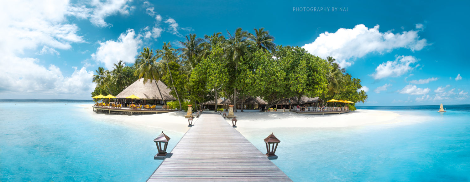 Maldives resort from the jetty with beach