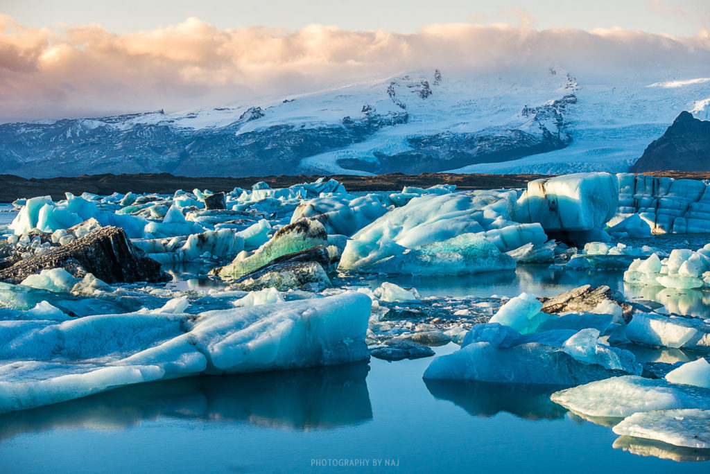 Icebergs from Jokulsarlon head slowly out to sea